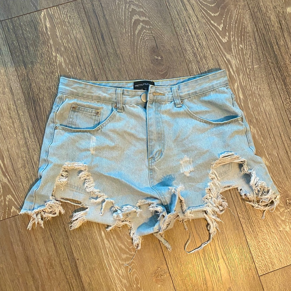 Light wash denim distressed shorts